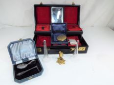 A vintage jewellery briefcase, a vintage