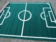 A modern rug with a green and white foot
