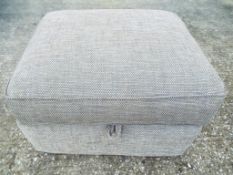 A modern upholstered footstool. Estimate