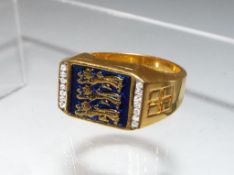 A gentleman's gold plated ring bearing t