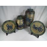 Four pieces of matching Egyptian style ceramics to include vases and plates,