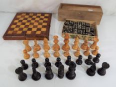 31 carved wooden chess pieces with 9.