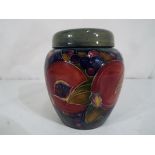 Moorcroft Pottery - a Moorcroft Pottery pomander jar and lid (lid A/F and attached to jar) in the