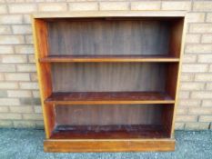 A set of wooden open book shelves approx 98cm x 92cm x 19.