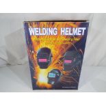 A welding helmet with auto-darkening welding filter (unused) Est £25 - £30 - This lot MUST be paid