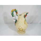 Clarice Cliff - a Clarice Cliff ceramic water jug decorated in the Celtic Harvest pattern with