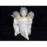 Lladro - a Lladro figurine group entitled Angels Group depicting three angels singing,