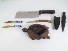A good lot to include a Hack Meisser cleaver, a Gerber knife,