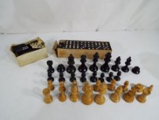 33 carved wooden chess pieces with 7.
