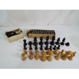 33 carved wooden chess pieces with 7.