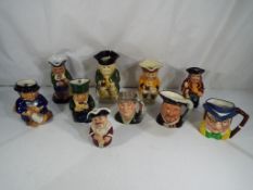 A collection of ten character Toby jugs to include Royal Doulton Henry VIII model D6647,