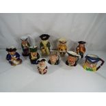 A collection of ten character Toby jugs to include Royal Doulton Henry VIII model D6647,