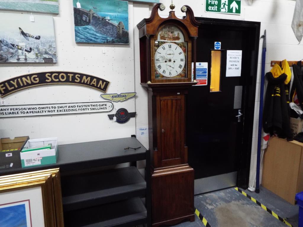 An early 19th century longcase clock, ca 1820, signed to the 13 inch arched, painted dial for J.