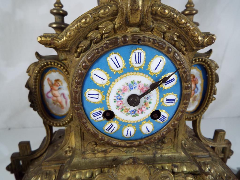 A late 19th century French clock garniture du cheminee, - Image 2 of 3