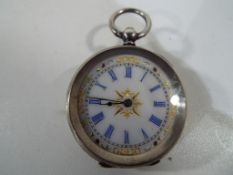 A lady's silver cased pocket watch, Roman numerals on a white dial, inscribed 935, serial #9341,