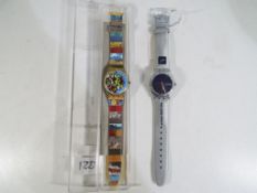 Swatch - two Swiss made Swatch wristwatches one in original case (2) Est £20 - £40 - This lot MUST