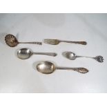 An Edward VII hallmarked silver straining spoon,