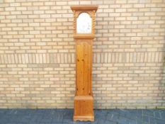A modern pine long case clock, 205cm (h) - This lot MUST be paid for and collected,