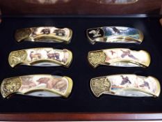 Franklin Mint - six Franklin Mint Collector Knives in mahogany display case.