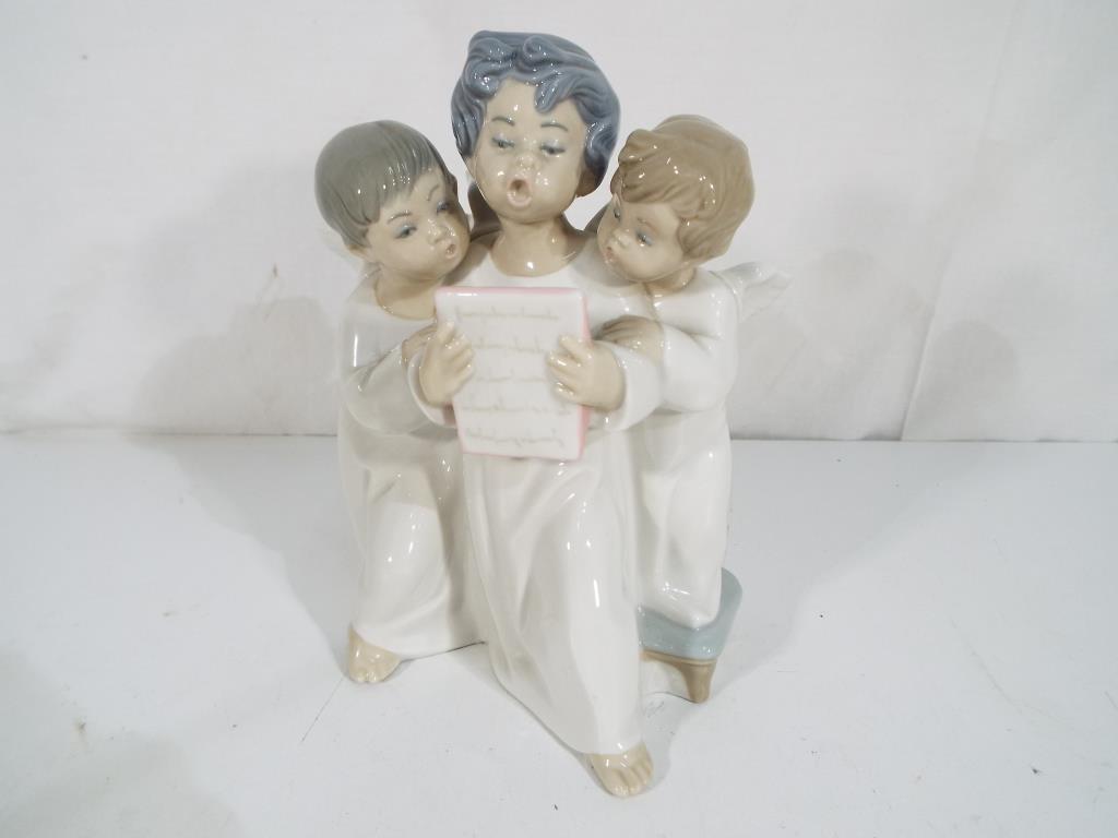 Lladro - a Lladro figurine group entitled Angels Group depicting three angels singing, - Image 2 of 2