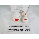 Four boxes containing twelve sets of 3 LED duck lights,