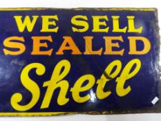An original enamel sign marked to both sides 'We Sell Sealed Shell',