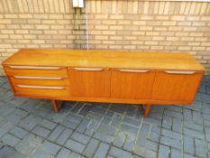 A good quality retro sideboard approx 73cm x 206cm x 42cm Est £40 - £50 - This lot MUST be paid for