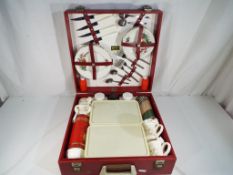 A vintage Brexton retro picnic case with contents - This lot MUST be paid for and collected,