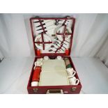 A vintage Brexton retro picnic case with contents - This lot MUST be paid for and collected,