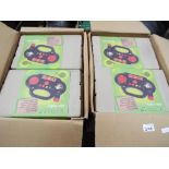 Two boxes containing twelve Ecotronic radios,