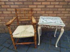 A good quality ash wood elbow chair and an occasional table (2) - This lot MUST be paid for and