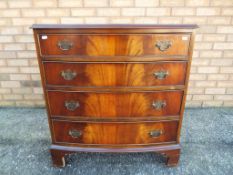 A bow fronted mahogany chest of four drawers approx 85cm x 79cm x 50cm Est £50 - £70 - This lot