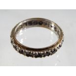 A lady's 9 carat gold and silver full eternity ring set with diamonds, approximate weight 2.