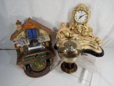Two novelty clocks to include the 'Memories of Steam Flying Scotsman Clock' by the Bradford Group