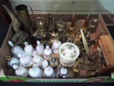 A good mixed lot of ornamental brass ware to include bells, candlesticks and an inkwell,
