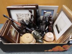 A collection of approx twenty African hardwood and soapstone figurines and a quantity of framed
