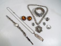 A small quantity of good quality costume jewellery to include a pair of silver clip on earrings set