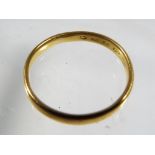 A hallmarked 22 carat gold wedding band, approximate weight 3.06 grams.