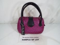 Unused retail stock - three Pia Rossini ladies handbags all sealed in original packaging (apart
