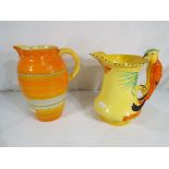 Shelley - a Shelley jug decorated in orange,