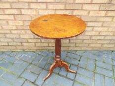A good quality round occasional table,