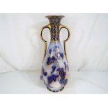 Doulton Burslem - A large Doulton Burslem twin handled conical form vase decorated with blue,