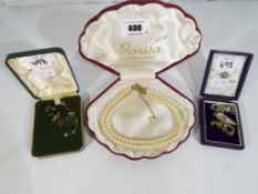 A good collection of jewellery to include a cased double stranded pearl choker,