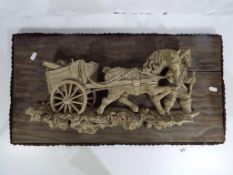 A good quality wall plaque depicting a man with horse and cart, mounted on wooden boards,