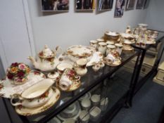 Fifty nine pieces of ceramic tea ware by Royal Albert decorated in the Old Country Roses pattern