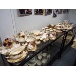 Fifty nine pieces of ceramic tea ware by Royal Albert decorated in the Old Country Roses pattern