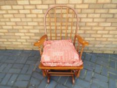 A good quality rocking chair with uphols