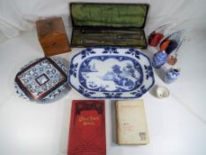 A good lot to include a small wooden storage box, a quantity of blue and white ceramics,