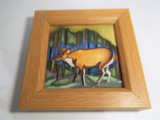 Moorcroft Pottery - a framed square plaq