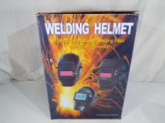 A welding helmet with auto-darkening wel